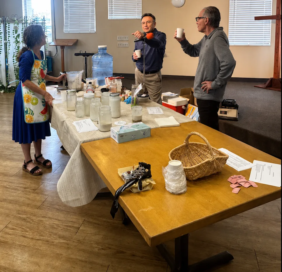 Health class presenter demonstrating plant-based food preparation